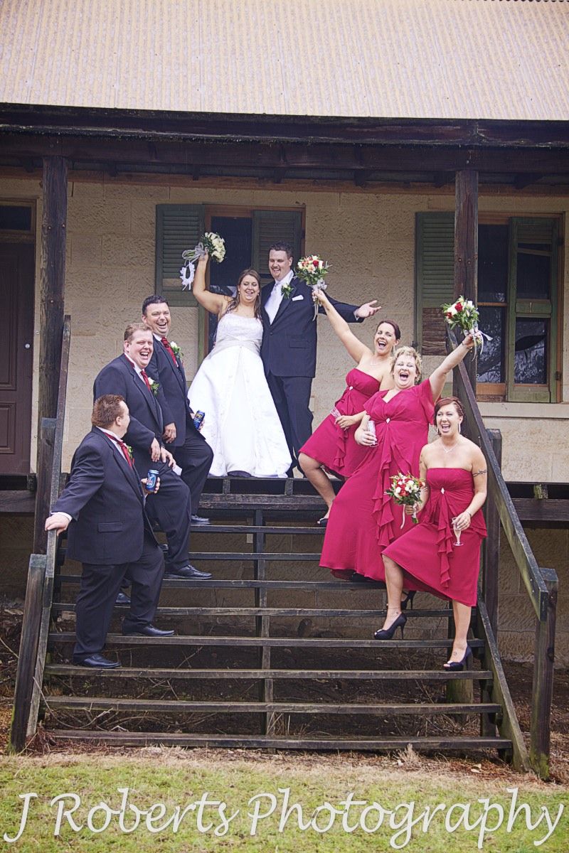 Bridal party laughing on steps of Historic homestead Riverside Oaks - wedding photography sydney
